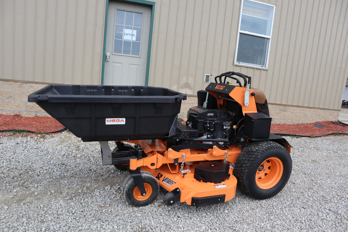 Manual mulch dump system for Scag V-Ride II

